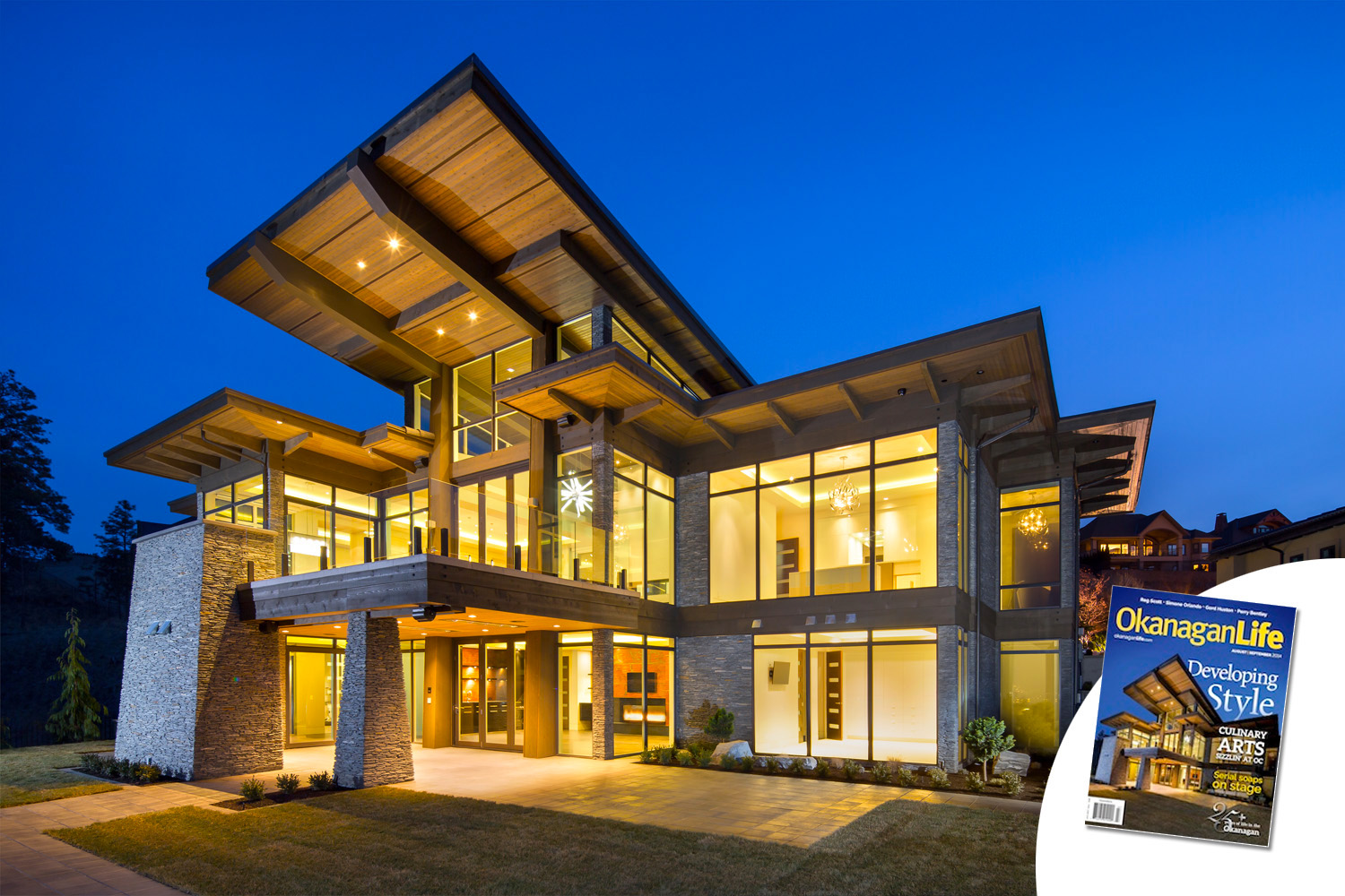 Commercial architectural photography of a luxury timber frame home in Kelowna at twilight, featured on the cover of Okanagan Life Magazine, shot by Jason Babakaiff.