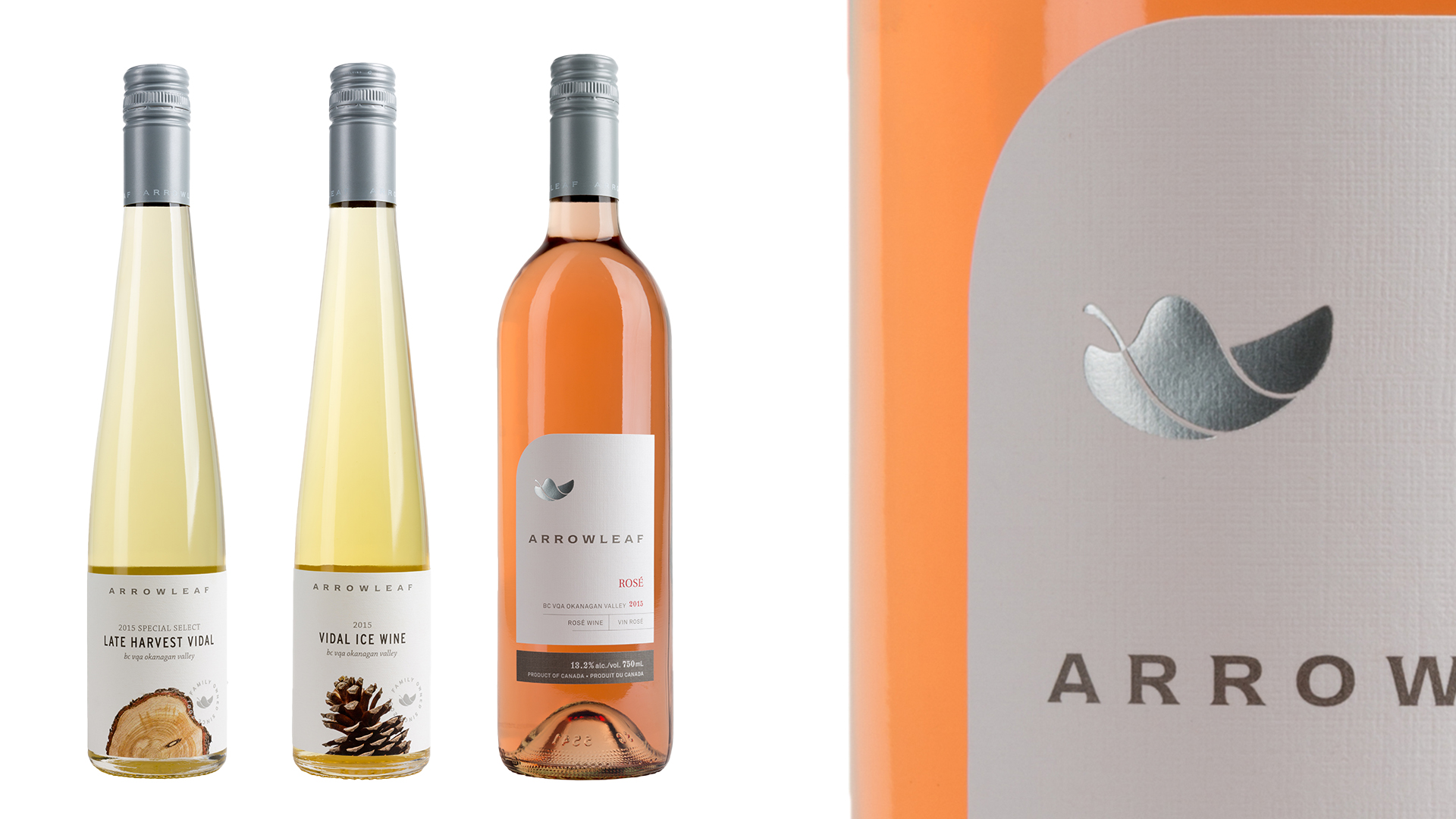 Commercial wine bottle photography of Arrowleaf Cellars Vidal Ice Wine and Rosé with detailed label texture and foil stamping, shot by Jason Babakaiff in Kelowna.